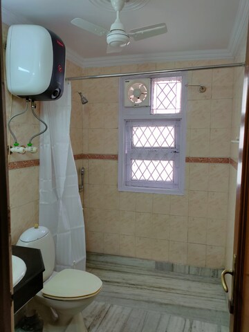Bathroom in 3 BHK Builder Floor at Defence Colony – for Rent