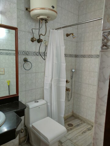 Bathroom in 3 BHK Builder Floor at Defence Colony – for Rent