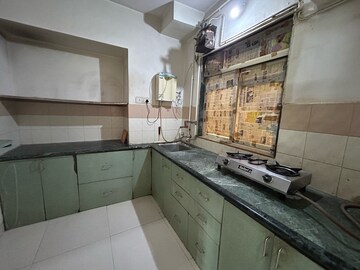 Kitchen in 1 BHK Apartment at Swastik Residency Phase II CHS Ltd, Pratha Pushp Society – for Rent