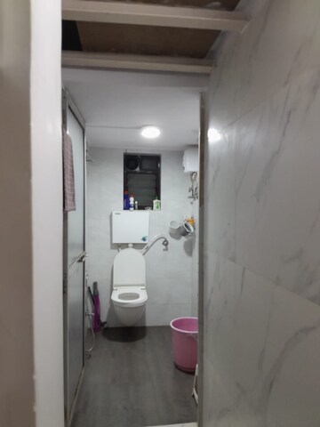 Bathroom in 2 BHK Apartment at Garden Colony, Mahim – for Rent