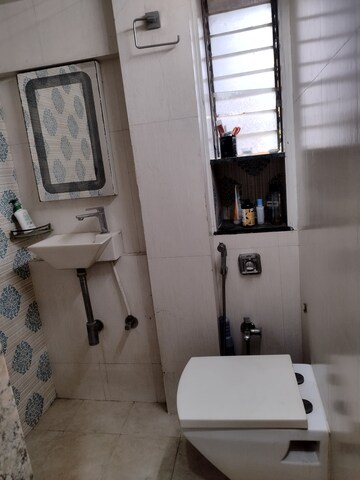Bathroom in 2 BHK Apartment at Garden Colony, Mahim – for Rent