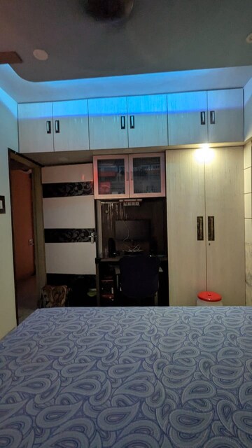 Bedroom in 2 BHK Apartment at Satellite Garden, Goregaon East – for Rent