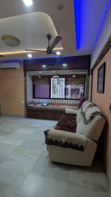 Living Room in 2 BHK Apartment at Satellite Garden, Goregaon East – for Rent