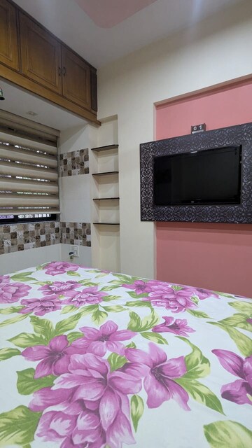 Bedroom in 2 BHK Apartment at Satellite Garden, Goregaon East – for Rent