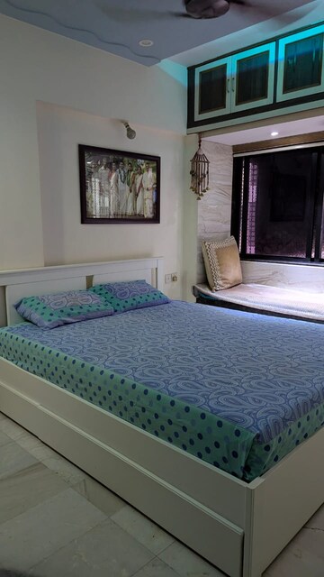 Bedroom in 2 BHK Apartment at Satellite Garden, Goregaon East – for Rent