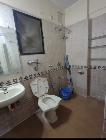 Bathroom in 1 BHK Apartment at Aaradhana Jai Matadee, Bhaskar Colony – for Rent