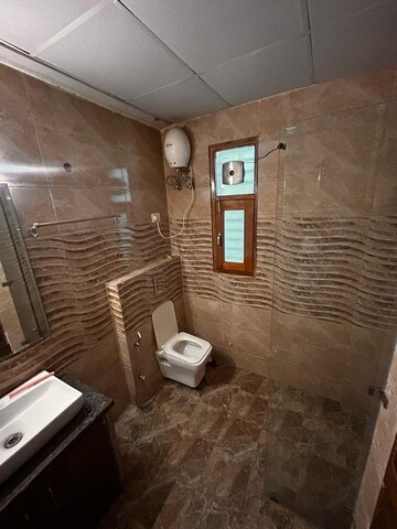 Bathroom in 3.5 BHK Builder Floor at Sector 55 – for Rent