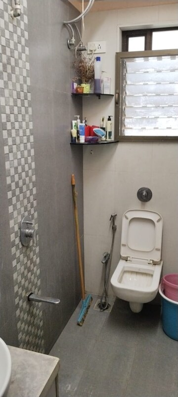 Bathroom in 2 BHK Apartment at Harmony Signature Towers, Owale – for Rent