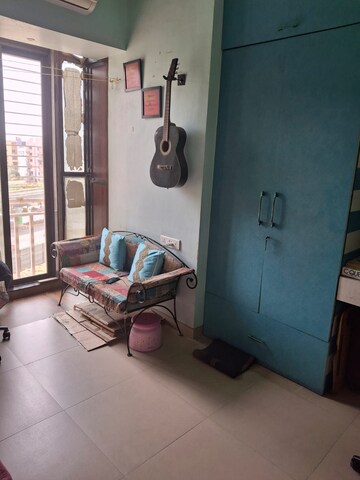 Living Room in 2 BHK Apartment at Harmony Signature Towers, Owale – for Sale
