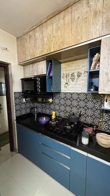 Kitchen in 3 BHK Apartment at Puranik Rumah Bali, Ghodbunder Road – for Rent