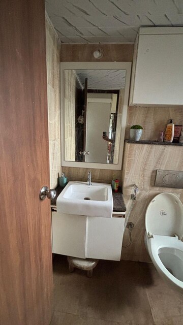 Bathroom in 3 BHK Apartment at Cosmos Jewels, Ghodbunder Road – for Rent