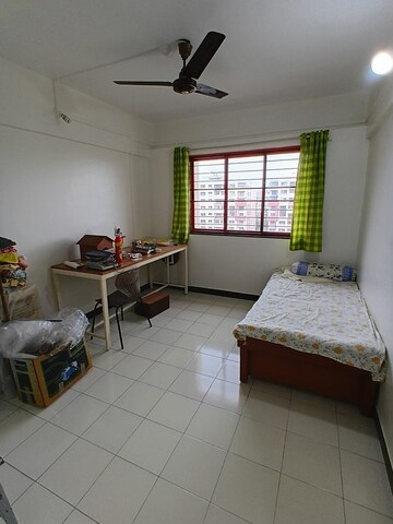 Living Room in 2 BHK Apartment at Woodland Avenue, Kothrud – for Rent