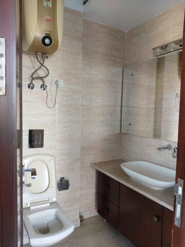 Bathroom in 3 BHK Builder Floor at Defence Colony – for Rent