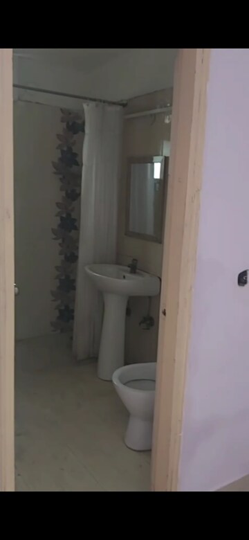 Bathroom in 3 BHK Apartment at Prateek Wisteria, Sector 77 – for Rent