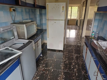 Kitchen in 2 BHK Apartment at Mangal Orchid Chs, Andheri West – for Rent