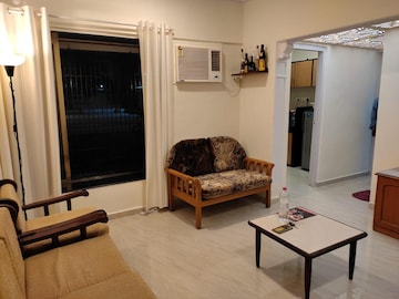 Living Room in 1 BHK Apartment at Sunrise Ellora Apartments, Andheri West – for Rent