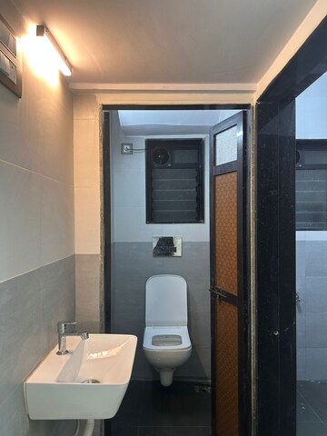 Bathroom in 1 BHK Apartment at Kiran Chandra CHS, Andheri West – for Rent