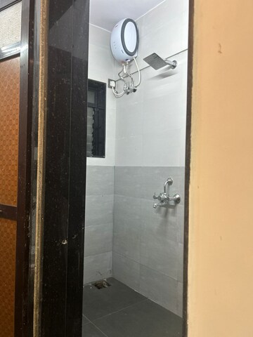 Bathroom in 1 BHK Apartment at Kiran Chandra CHS, Andheri West – for Rent