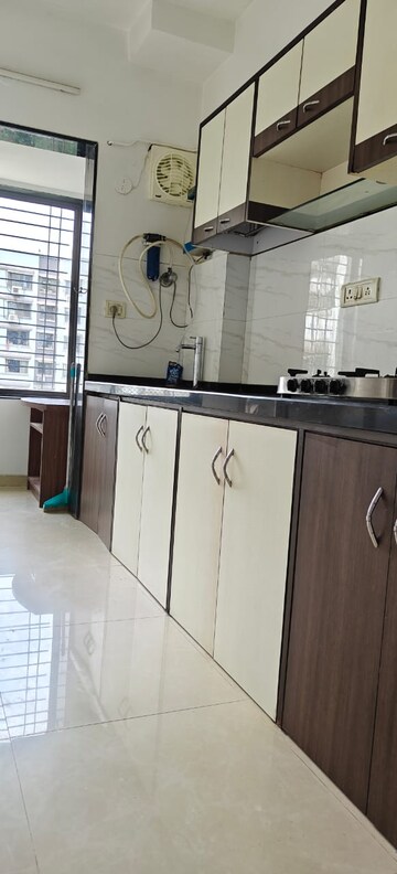 Kitchen in 2 BHK Apartment at Greenwoods CHS, Andheri East – for Rent