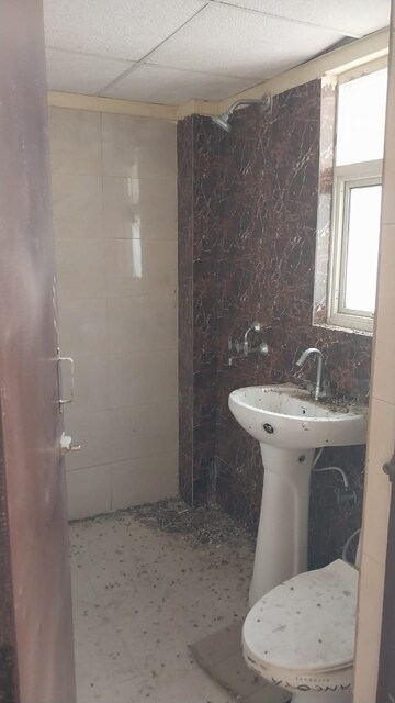 Bathroom in 1 BHK Apartment at Eureka Diya Green City, Raj Nagar Extension – for Sale