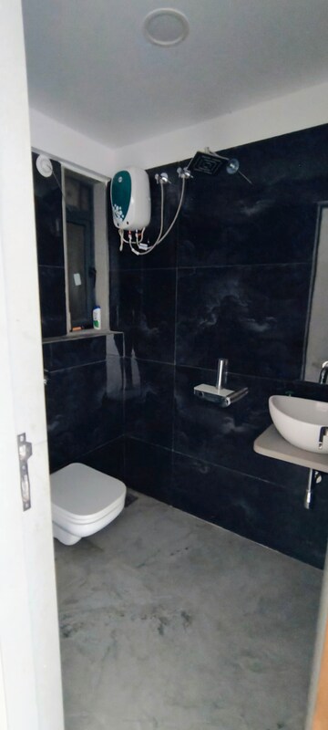 Bathroom in 1 BHK Apartment at UK Iridium, Kandivali East – for Rent