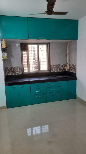 Kitchen in 1 BHK Apartment at Unnat Nagar CHS, Goregaon West – for Rent