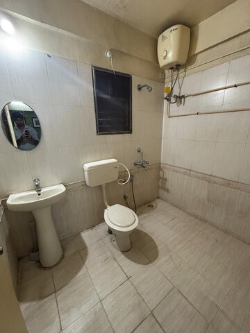 Bathroom in 2 BHK Apartment at GK Roselands Rhythm, Pimple Saudagar – for Rent
