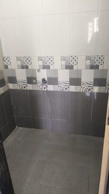 Bathroom in 1 BHK Apartment at Unnat Nagar CHS, Goregaon West – for Rent