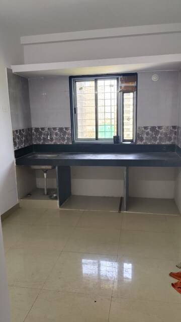 Kitchen in 1 BHK Apartment at Unnat Nagar CHS, Goregaon West – for Rent
