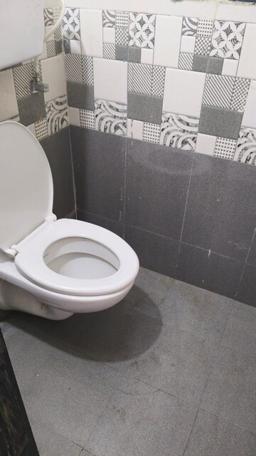 Bathroom in 1 BHK Apartment at Unnat Nagar CHS, Goregaon West – for Rent
