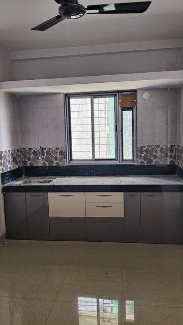 Kitchen in 1 BHK Apartment at Prem Tower, Goregaon West – for Rent