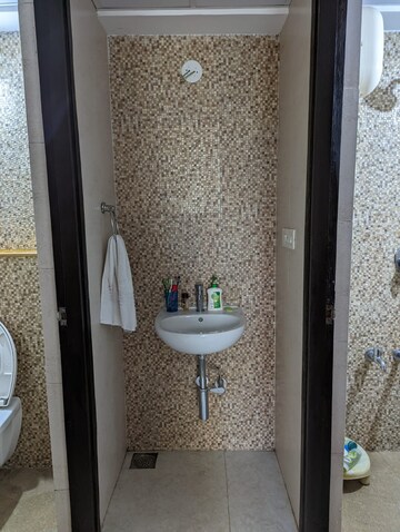 Bathroom in 1 BHK Apartment at Lodha Palava City Lakeshore Greens, Dombivli East – for Rent