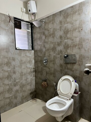 Bathroom in 2 BHK Apartment at Bini Winspace Amelio, Andheri West – for Rent