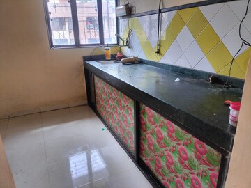 Bedroom in 1 BHK Apartment at Garden Court, Waghbil – for Rent