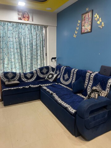 Living Room in 1 BHK Apartment at Lodha Palava Downtown Dombivli East, Dombivli East – for Rent