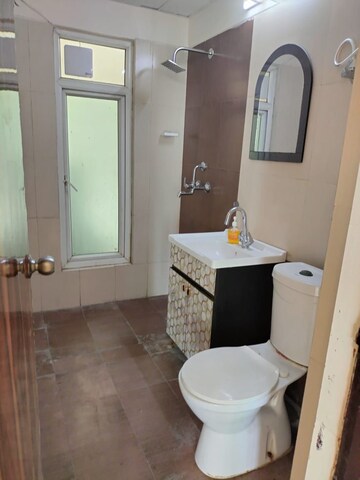 Bathroom in 2.5 BHK Apartment at Mahagun Moderne, Sector 78 – for Sale