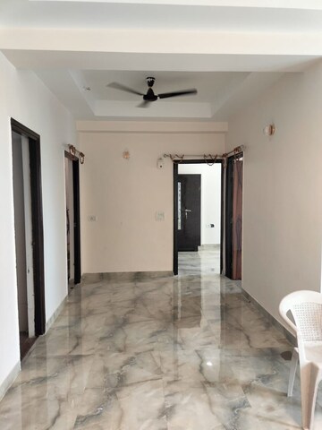 Building Lobby in 2.5 BHK Apartment at Mahagun Moderne, Sector 78 – for Sale