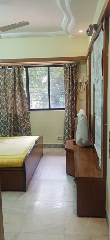Bedroom in 2 BHK Apartment at Vasant Valley Complex, Malad East – for Rent