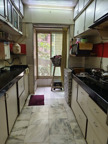 Kitchen in 2 BHK Apartment at Riddhi Garden, Malad East – for Rent