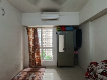 Living Room in 2 BHK Apartment at Lodha Amara, Kolshet Road – for Sale