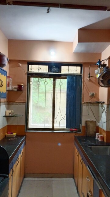 Kitchen in 2 BHK Apartment at Lodha Paradise, Majiwada – for Rent