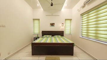Bedroom in 4 BHK Independent House at Amala Nagar – for Sale