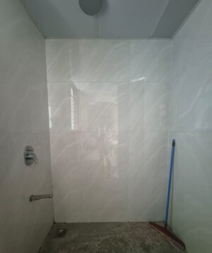 Bathroom in 2 BHK Apartment at Courtyard by Narang Realty and The Wadhwa Group, Pokhran Road No Two – for Sale