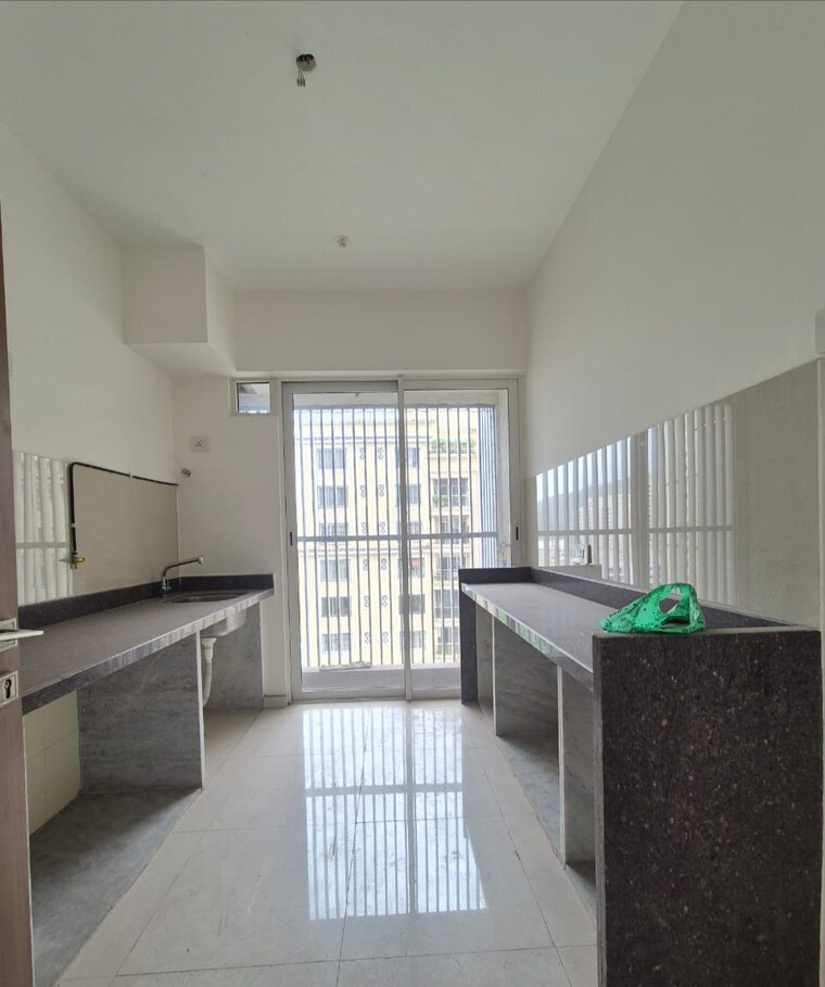 Kitchen, courtyard-by-narang-realty-and-the-wadhwa-group 2 Bedroom 789 Sq.Ft. Apartment In Pokhran Road No Two Thane 8956294