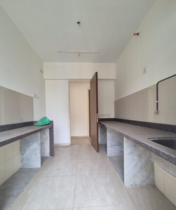 Kitchen in 2 BHK Apartment at Courtyard by Narang Realty and The Wadhwa Group, Pokhran Road No Two – for Sale