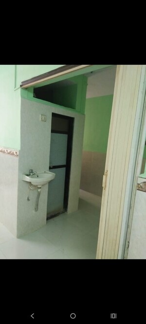 Master Bedroom in 1 RK Apartment at Evergreen CHS, Shree Nagar – for Sale