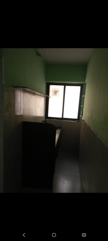 Kitchen in 1 RK Apartment at Evergreen CHS, Shree Nagar – for Sale