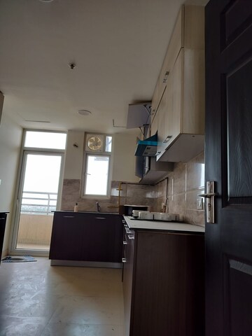 Kitchen in 3 BHK Apartment at Wave Amore, Sector 32 – for Rent