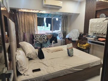 Bedroom in 2 BHK Apartment at Evershine Greens, Andheri West – for Rent