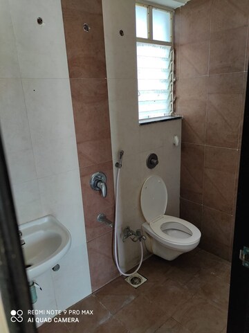Bathroom in 1 BHK Apartment at Ranade Yashodhan, Mayur Colony – for Rent